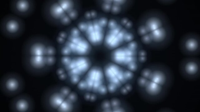 Softly glowing bokeh circles form a mesmerizing mandala pattern for a seamless looping background.