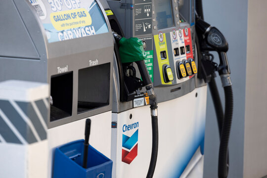 Fullerton, California, USA - September 14, 2026: Diesel and gasoline pumps hang at a Chevron gas station while prices surge due to the ongoing war with Iran.