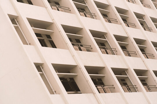 white gray concrete residence building in architecture background	