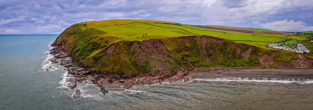 St Bees Beach and Coastal Cliffs with Holiday Park in Cumbria England
