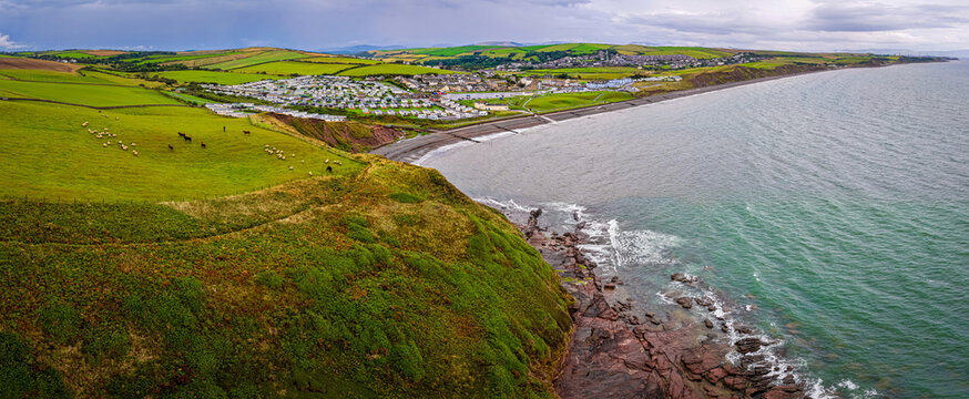 St Bees Beach and Coastal Cliffs with Holiday Park in Cumbria England