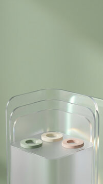Minimalist 3D Abstract Podium with Frosted Glass Panels and Three Pastel Torus Rings on Sage Green Background for Product Display and Showcase