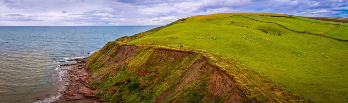 St Bees Beach and Coastal Cliffs with Holiday Park in Cumbria England