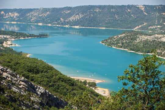 Stunning Aerial View of Verdant Lake and Mountains