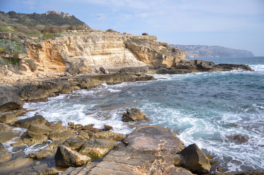 Coastal Scenery with Rocky Shoreline and Waves