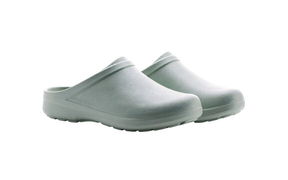 Pair of white slip-on clogs for medical or kitchen use solated on transparent background
