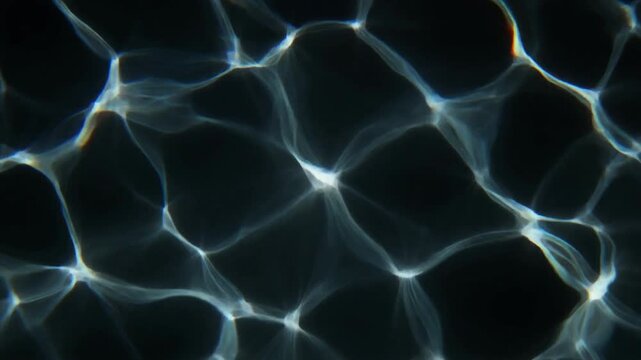 Cinematic 4K Underwater Caustic Light Patterns with Sharp Wavy Lines Shimmering Against a Dark Black Backdrop for Background