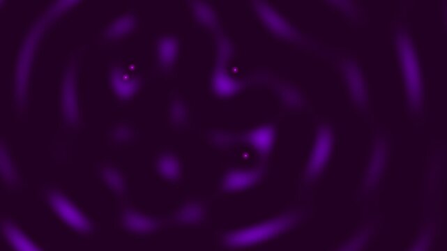 A deep purple abstract loop background featuring soft glowing spots and blurred organic patterns