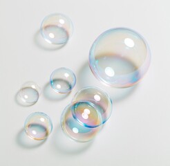 Obraz premium Colorful soap bubbles on white background