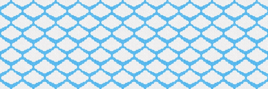 Seamless blue and white quatrefoil geometric pattern background with soft fabric texture for design.