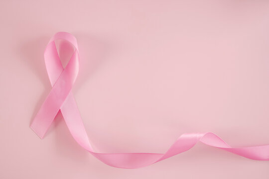 Pink Ribbon with pink background, October pink, breast cancer awareness, world cancer day concept