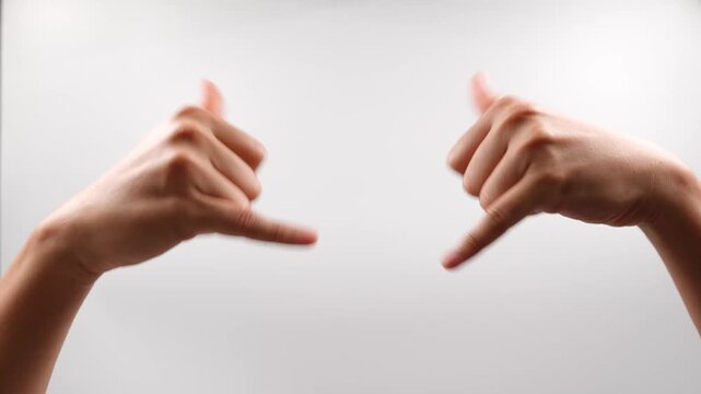 To sign the word "play" in American Sign Language (ASL), you use both hands shaped like the letter "Y"