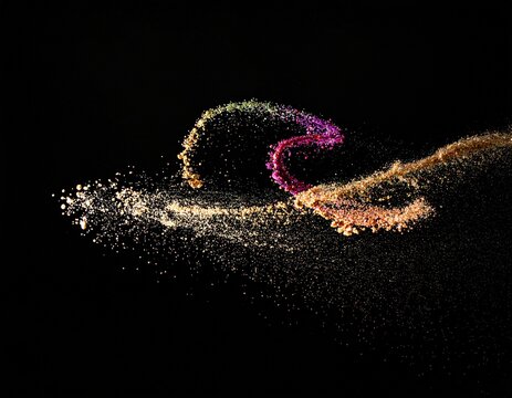 黒背景に舞い上がる高級感のある輝くゴールドのグリッター　クリスマス　魔法