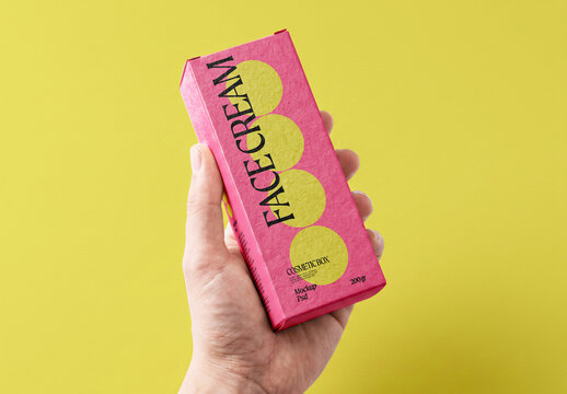 Hand Holding Cosmetic Box Mockup