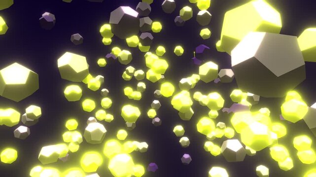 Glowing yellow polyhedral particles floating in dark space abstract animation.