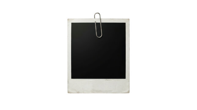 Vintage blank polaroid photo frame with a metal paper clip isolated on transparent background