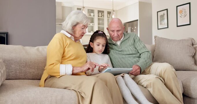 Grandparents, education and child with tablet in home, talk or senior people with skill development. Digital literacy, knowledge and family with technology, elearning and bonding with girl in lounge