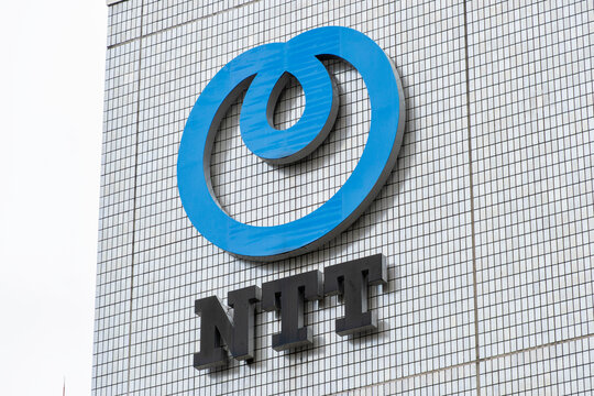 NERIMA-KU, TOKYO, JAPAN - SEPTEMBER 13, 2026: NTT corporate logo mark on a building facade in Nerima-ku, Tokyo.