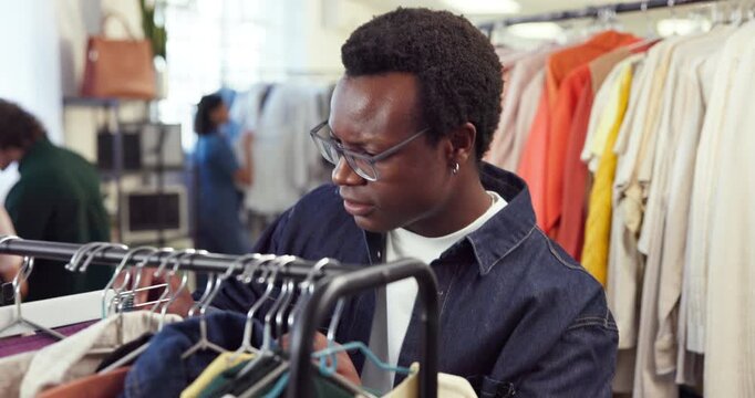 Shopping, rack or customer in store with clothing, outfit search or decision with trendy style. Retail, check or man in boutique with apparel collection, garment choice or option for fashion purchase