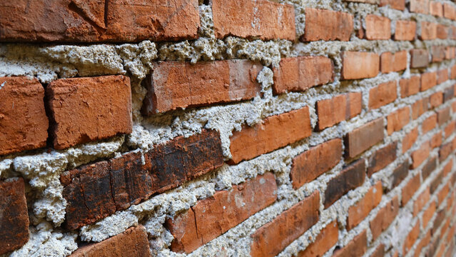 Perspective View of Rough Red Brick Wall Texture with Cement Mortar
