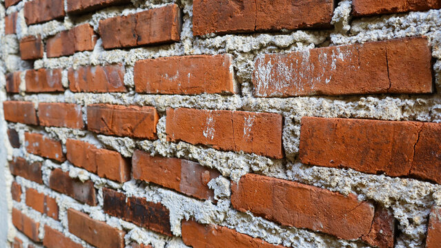 Perspective View of Rough Red Brick Wall Texture with Cement Mortar