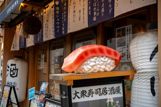 NERIMA-KU, TOKYO, JAPAN - SEPTEMBER 13, 2026: A giant 3D sushi model object display outside a sushi izakaya restaurant near Shakujii-koen Station in Nerima-ku, Tokyo.