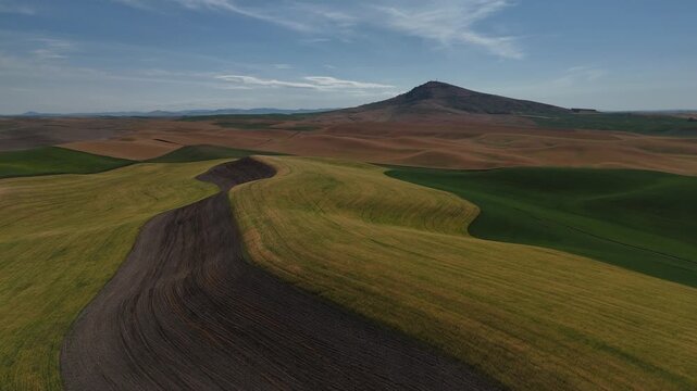 Steptoe Butte Rising Above Rolling Hills Of The Palouse In Washington Aerial Drone 4K Video