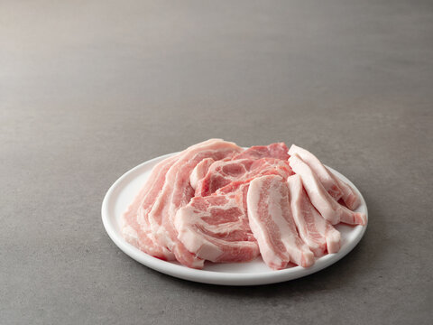 Pork of various cuts on a plate