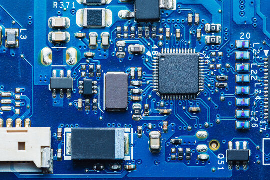 Blue printed circuit board detail with components