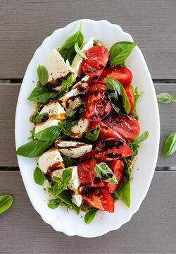 Italian Caprese Salad with Mozzarella Cheese and Tomatoes. Top view
