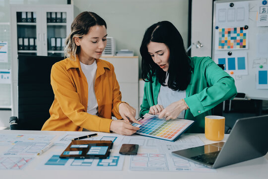 team of UI UX web designer are working together to develop mobile responsive websites with UI UX front end designer previews