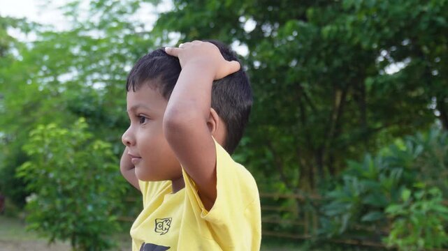Joyful young child playing outdoors