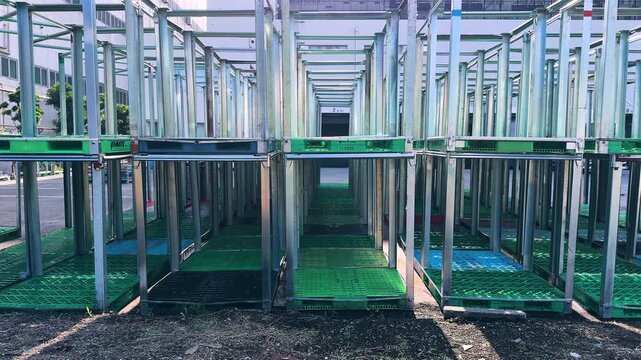 Repeating Metal Frames and Industrial Storage Structures at a Logistics Facility