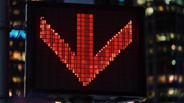 A red arrow sign directs downwards with a digital grid pattern, set against a blurred background of city lights at night. ..Created with Generative AI, not depicting real subjects.