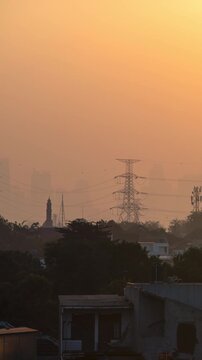 Vertical video - Timelapse of Jakarta skyline covered by heavy air pollution in the afternoon