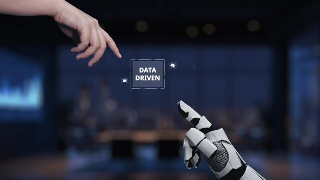 Visual representation of hands interacting with a digital screen showcasing data driven concepts, symbols, and icons in a contemporary office space. Synapse