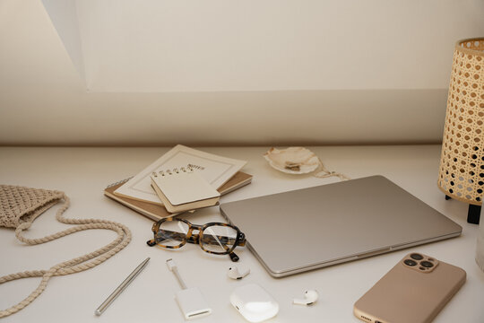 Minimalist Work From Home Desk Setup On White Surface