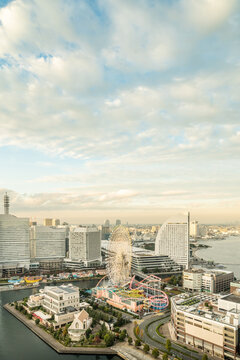 aerial view of yokohama and minato mirai city skyline, cityscape during golden hour sunset