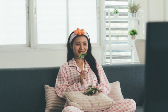 Woman enjoying life at home, promoting healthy eating, wellness, and a balanced lifestyle. Concept of natural nutrition, mindfulness, and modern healthy living.
