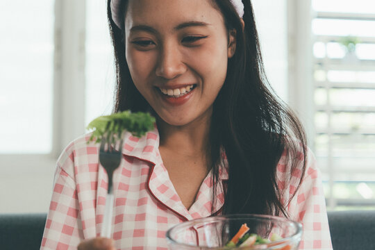 Woman enjoying life at home, promoting healthy eating, wellness, and a balanced lifestyle. Concept of natural nutrition, mindfulness, and modern healthy living.