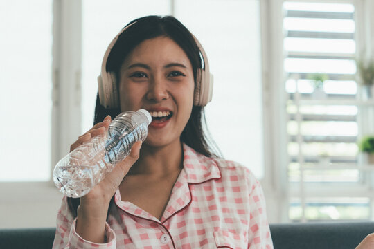 Woman enjoying life at home, promoting healthy eating, wellness, and a balanced lifestyle. Concept of natural nutrition, mindfulness, and modern healthy living.