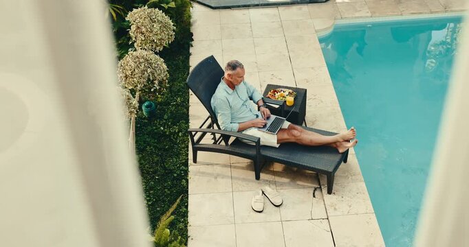 Man, holiday and swimming pool with laptop in resort for online network, research or accommodation. Top view, male person or typing on computer or chair by poolside for vacation or weekend in retreat