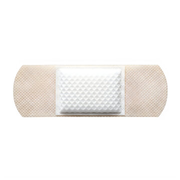 Beige adhesive bandage on skin