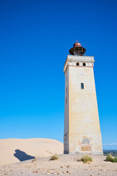 View of the Rubjerg Knude lighthouse on the island Vendsyssel-Thy in Denmark.