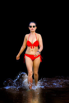 Woman in red bikini isolated