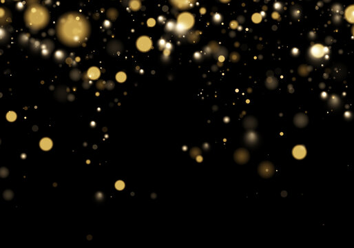 Scattered golden and white bokeh lights float softly against a dark background. The blurred orbs vary in size, creating a delicate and glowing effect. This image is ideal for festive.