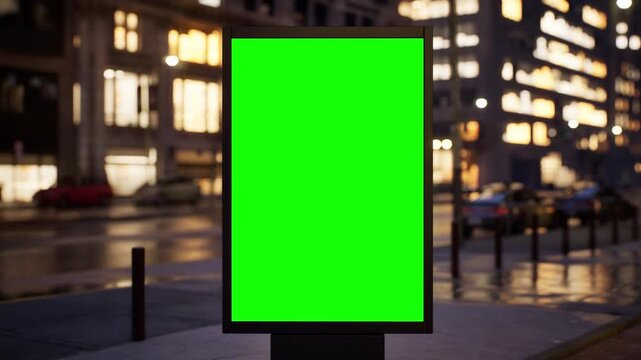 Vertical green screen citylight sign on a metropolitan street at dusk as the city lights come on, cloudy sky. Time lapse of city traffic, bokeh lights and moving cars. Clean chroma key area for