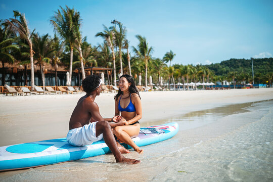 Couple enjoying their tropical vacation with peace of mind, secured by reliable travel insurance