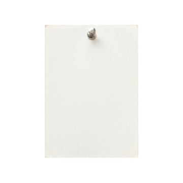 Blank white paper sheet attached with a metal push pin