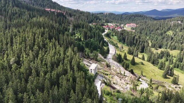 Aerial view of a landslide and terrain erosion near mountain resort